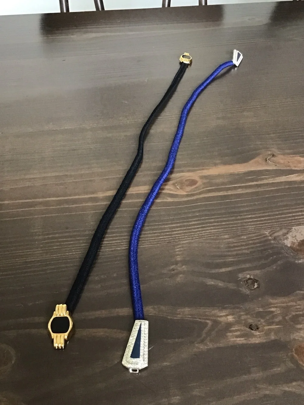 Vintage skinny elastic cord cinch belts.